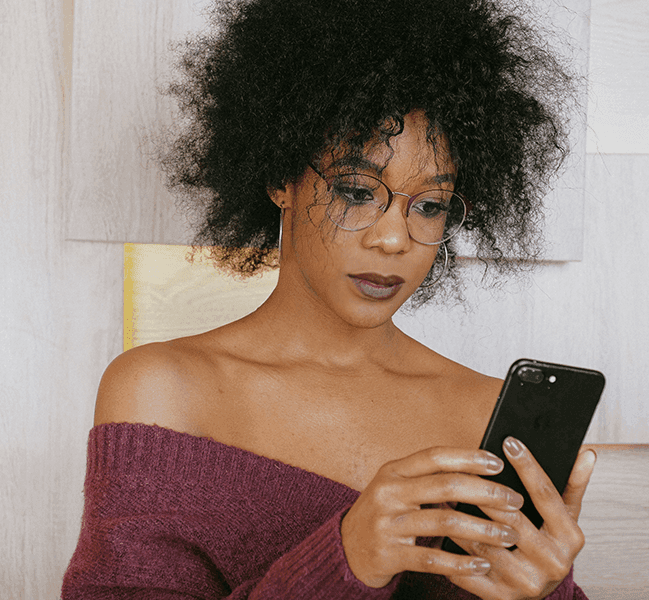 Black woman texting